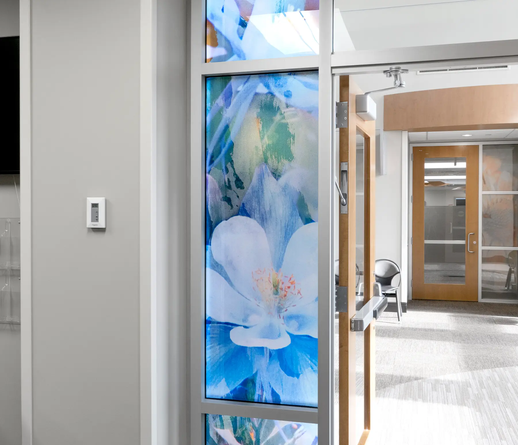 Window film featuring the artwork "Blue Columbine"